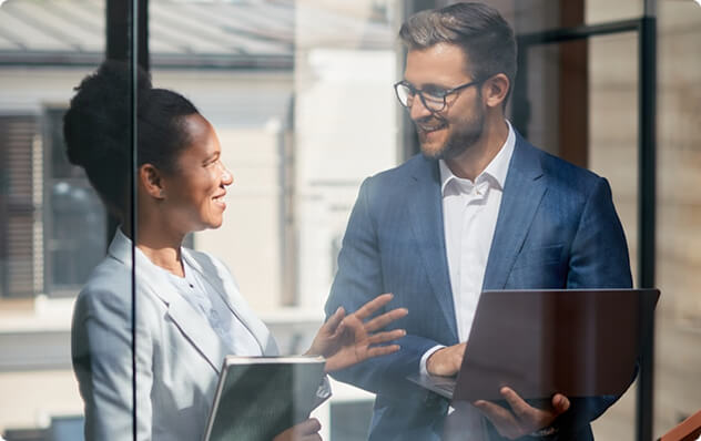 man and women discussing work